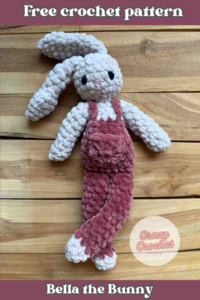 free crochet pattern of a charming handmade bunny, complete with her signature overalls.